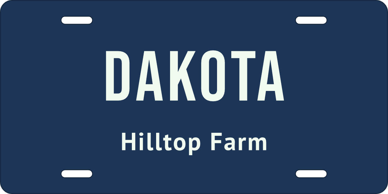 No border: a stall sign reading Dakota, Hilltop Farm