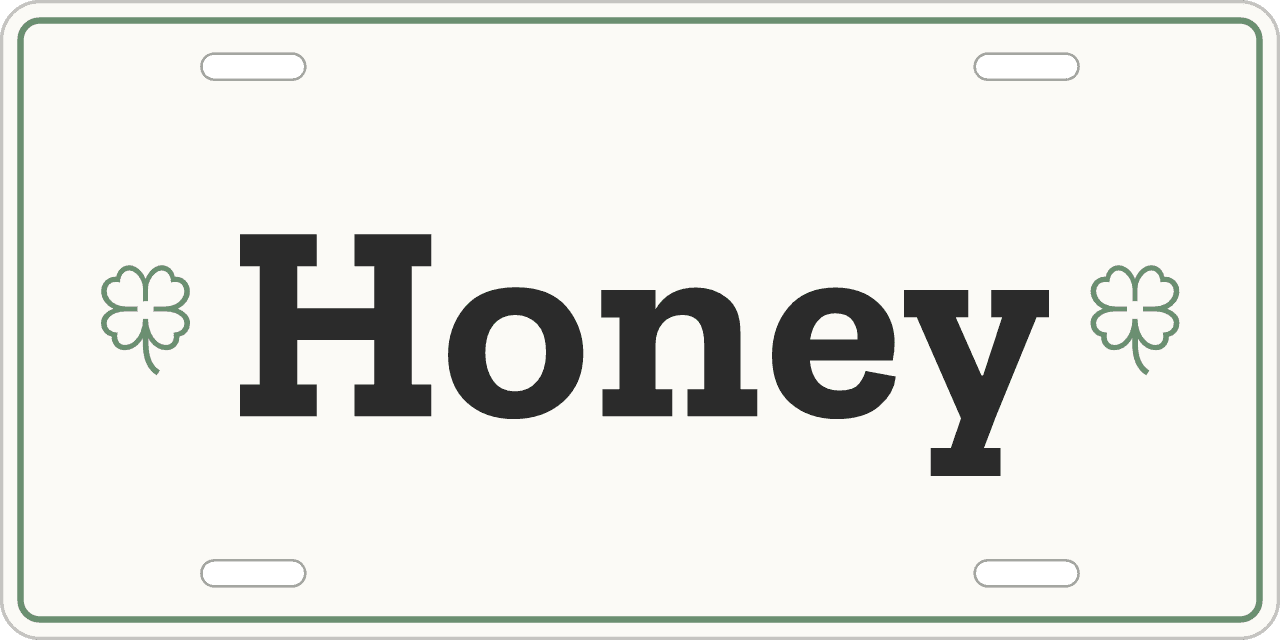 A clover symbol: a stall sign reading Honey