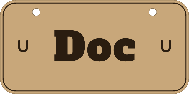 On the 6×3″ mini: a stall sign reading Doc