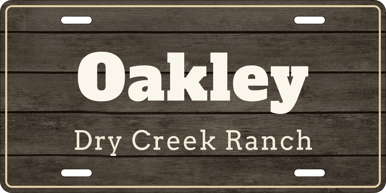 Barnwood: a stall sign reading Oakley, Dry Creek Ranch