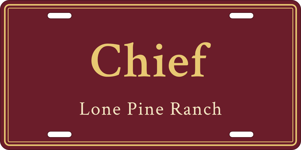 Maroon and gold: a stall sign reading Chief, Lone Pine Ranch