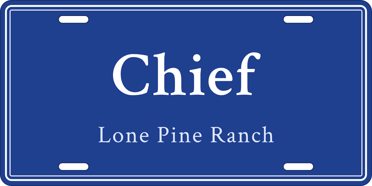 Royal blue and white: a stall sign reading Chief, Lone Pine Ranch