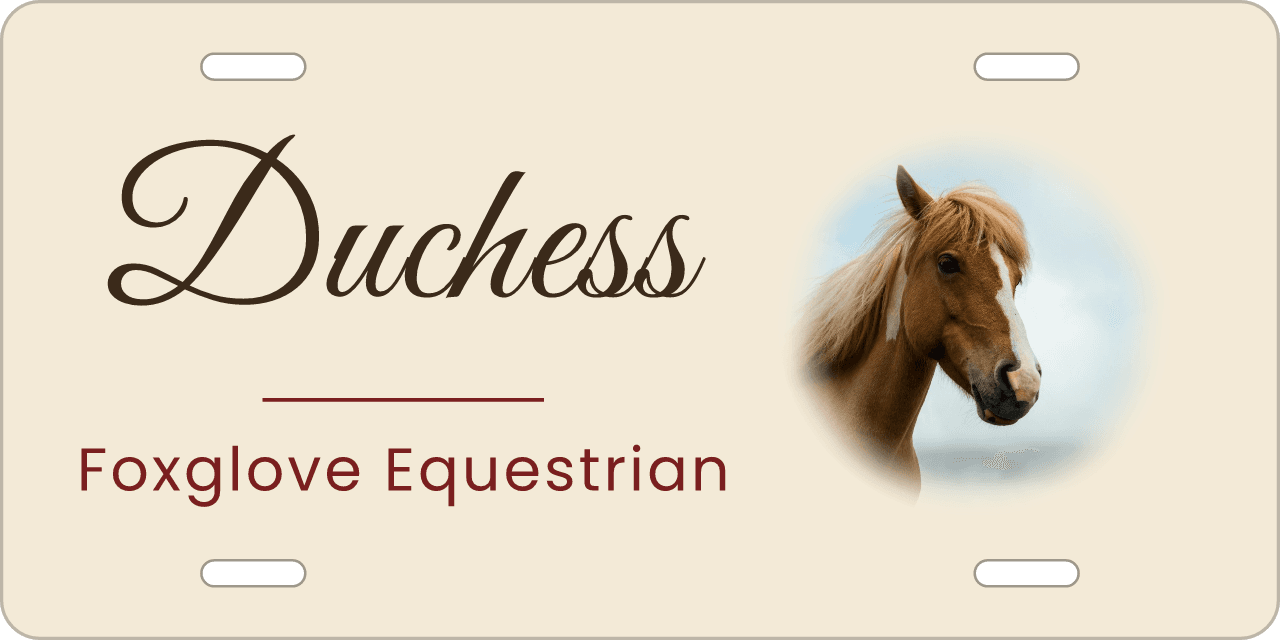 A round medallion: a stall sign reading Duchess, Foxglove Equestrian